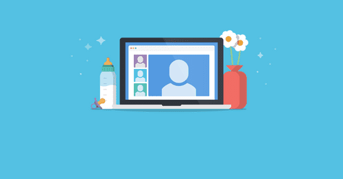 Baby bottle, laptop and desk flower